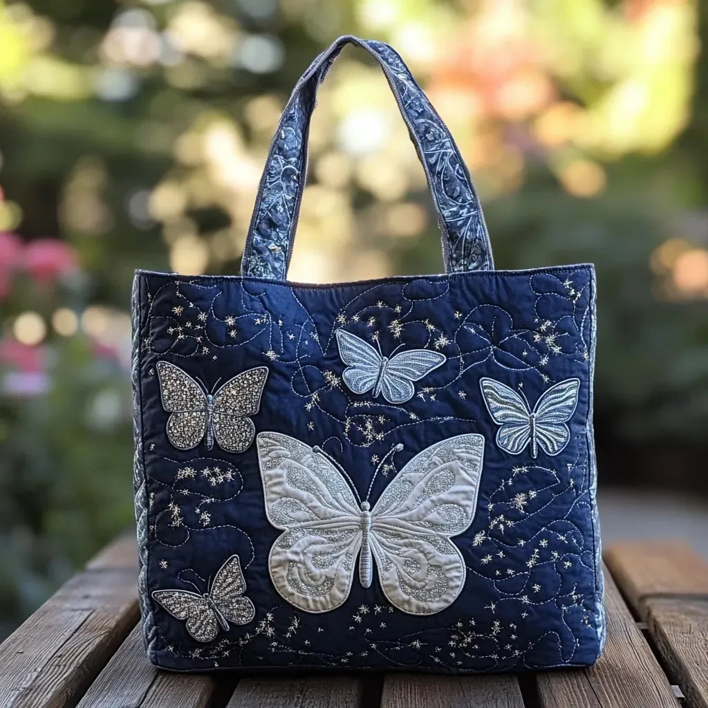 Borsa artigianale con farfalla argentata